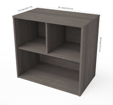 Load image into Gallery viewer, Petite Bookcase in Bark Gray with Three Storage Cubbies
